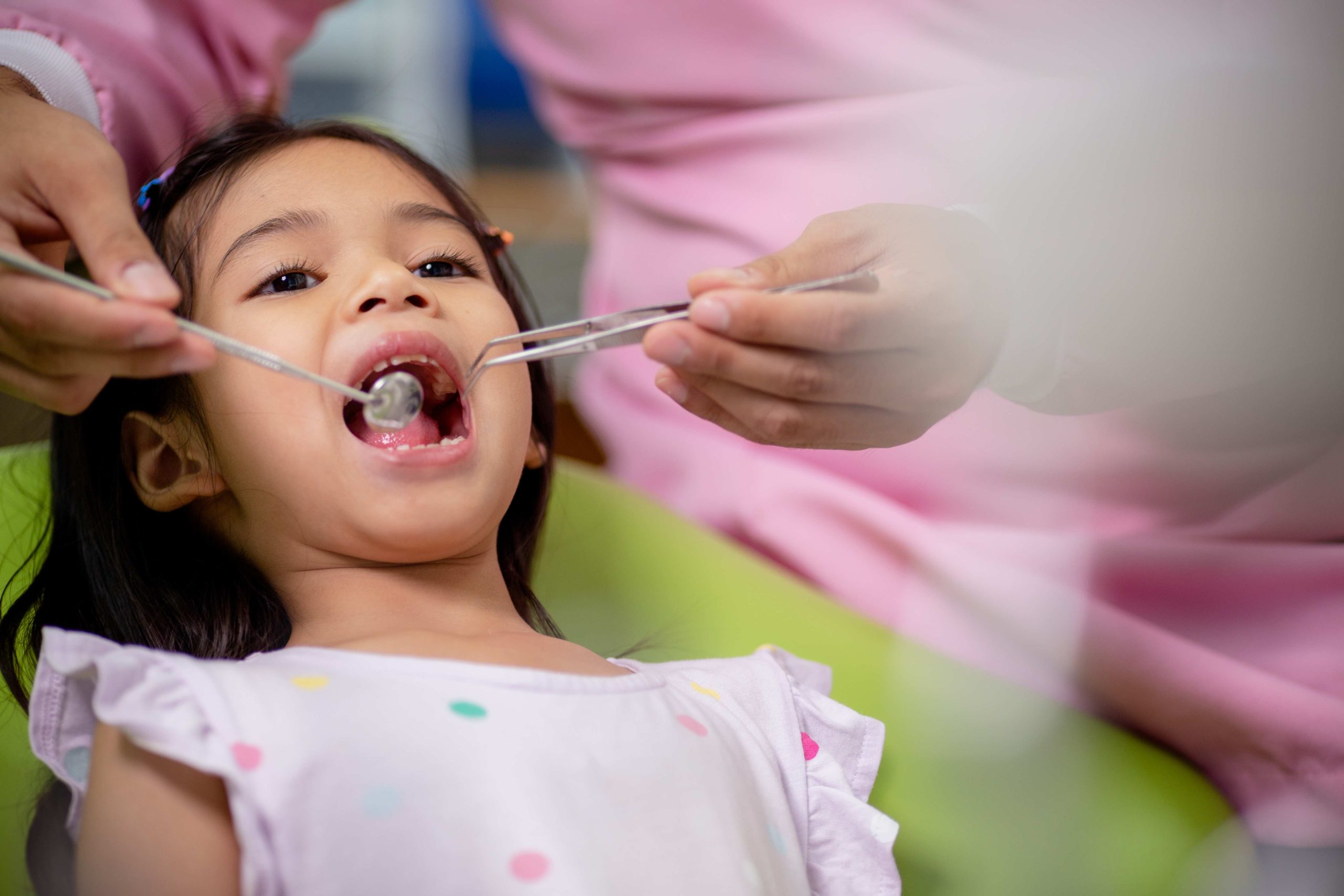 Little Asian girls teeth are healthy in the Dental office. Denta